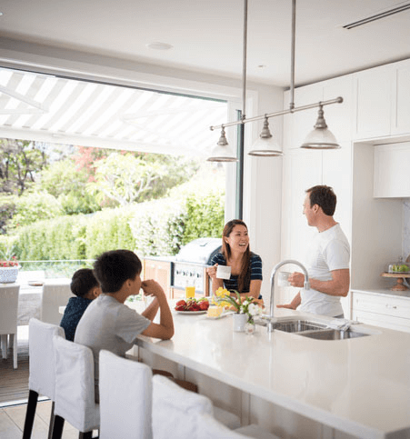 A family in their dream home, made possible with the right home loan solution.